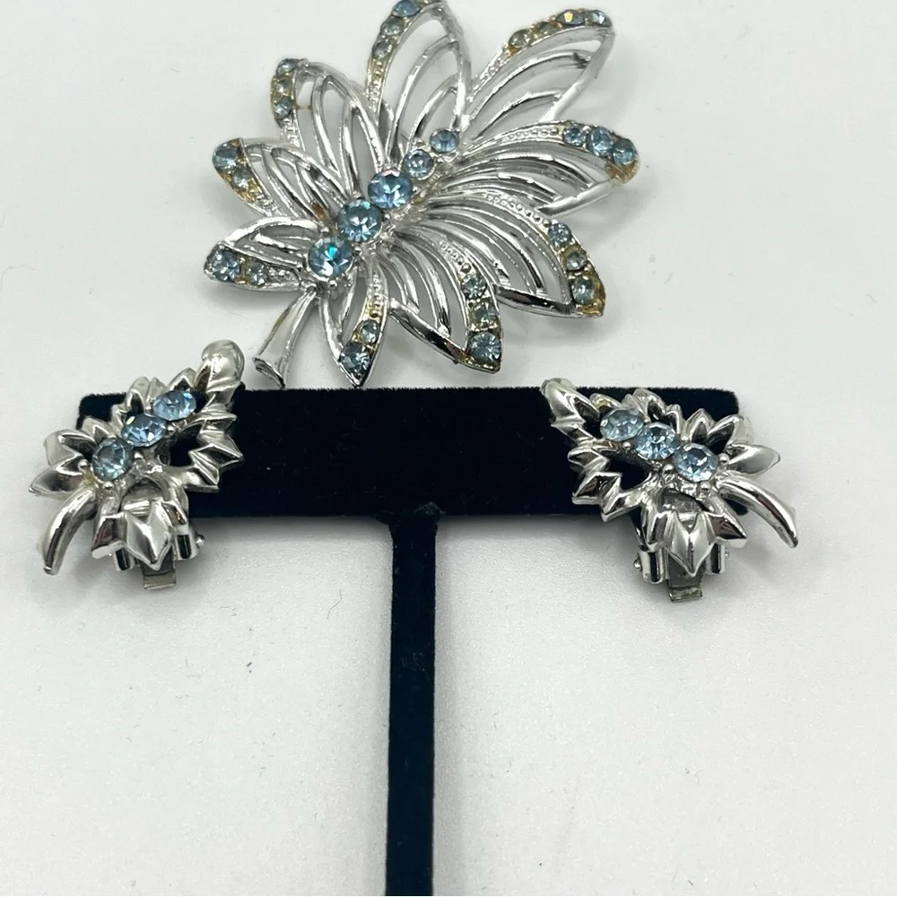 Vintage blue rhinestone butterfly brooch with matching clip earrings silver tone